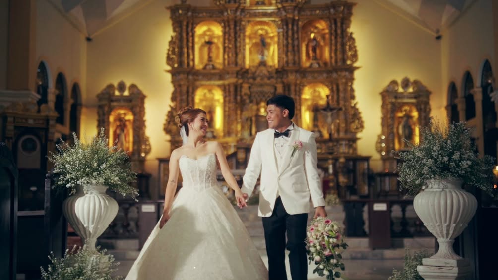 Basi and Erika holding hands in their Blaze Kultura wedding film